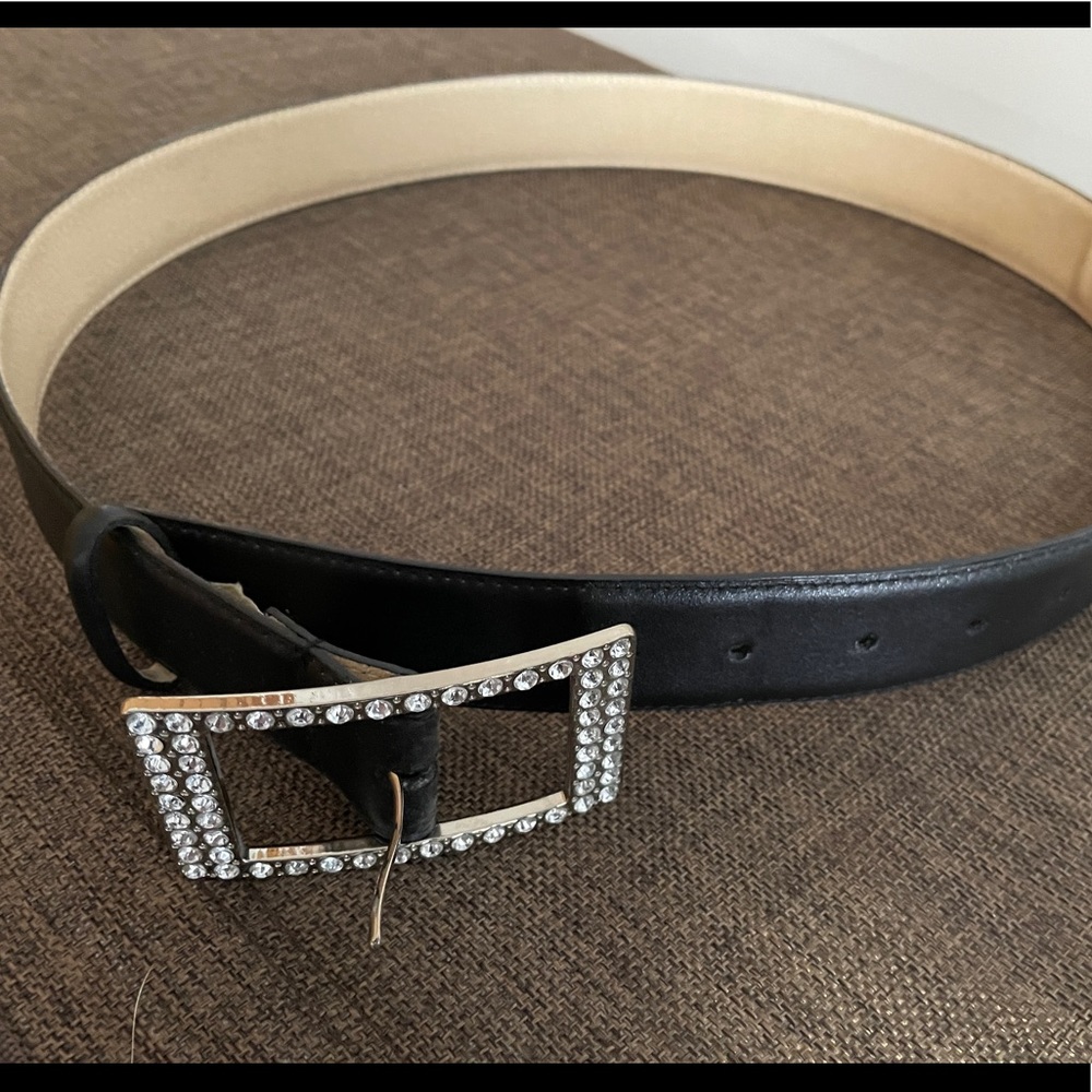Belt with crystal studded buckle. Measures 38.5”